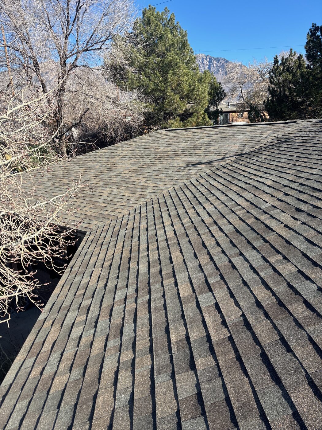 Hip roof replacement — Utah blue sky