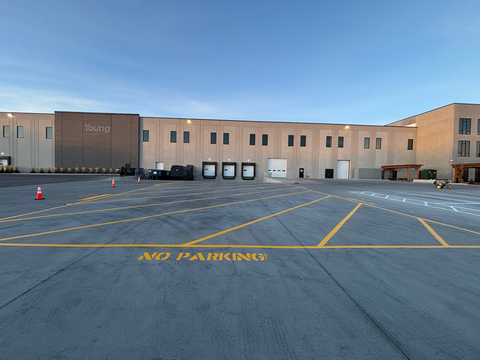 Commercial warehouse parking lot striping — KCR Construction, Utah County